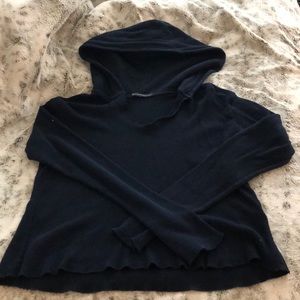 A navy long sleeve Brandy Melville sweater